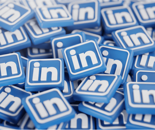 Pile of blue LinkedIn logo icons